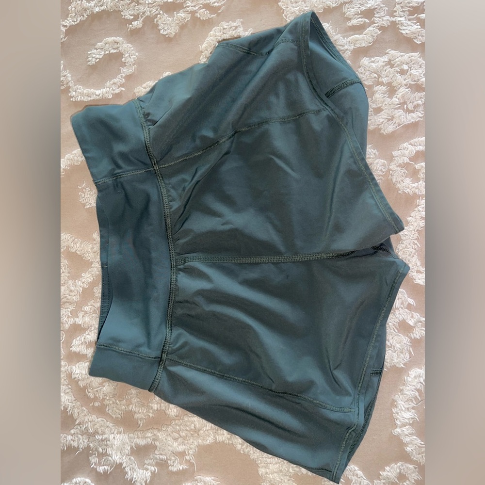 Green Lululemon shorts, size four